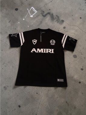 AMIRI Black Tee with White Logo and Sleeve Stripes
